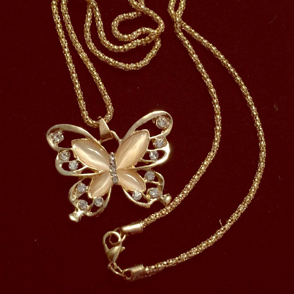Woman’s rose gold opal butterfly chain necklace
